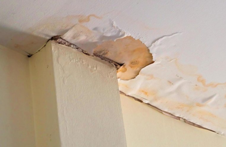 water damaged ceiling needing a quick roof repair
