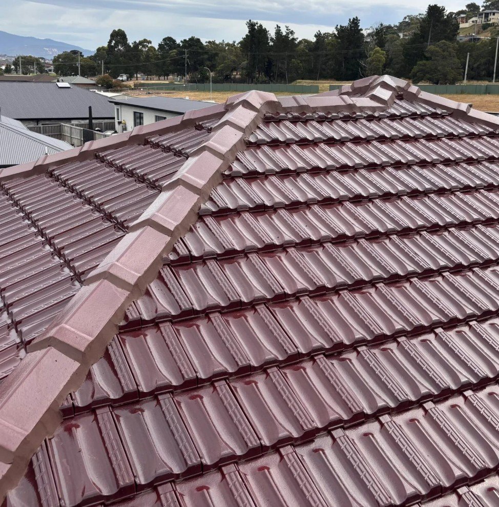 Newly restored tile roof with newly re-pointed ridge capping in Hobart